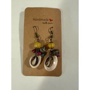 handcrafted, multi-colored dangle style featuring beads and shell accents